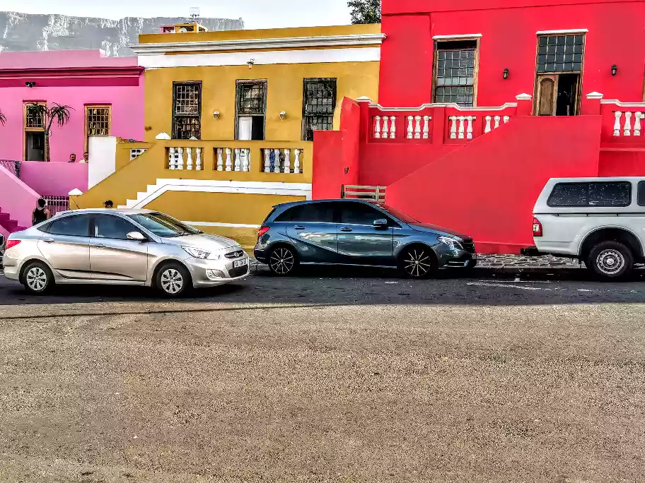 Bright historical row houses lining a street in the Bo-Kaap