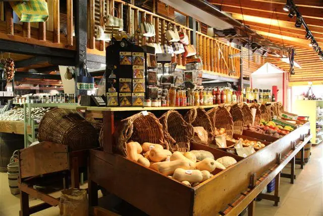 The welcoming rustic storefront and courtyard of Peregrine Farm Stall in Elgin
